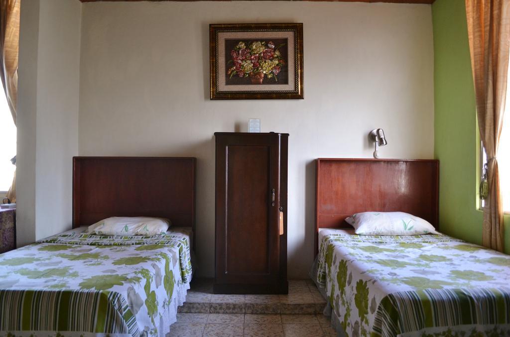 Hotel Oasis San Salvador Pokoj fotografie